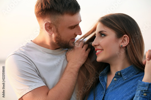 Young couple flirting and b...
