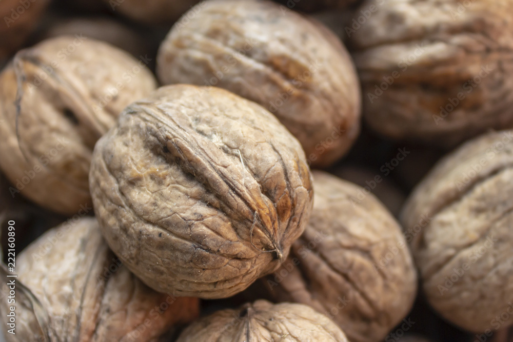 Cropped close-up shoot of batch of walnuts Cropped close-up shoot of batch of walnuts