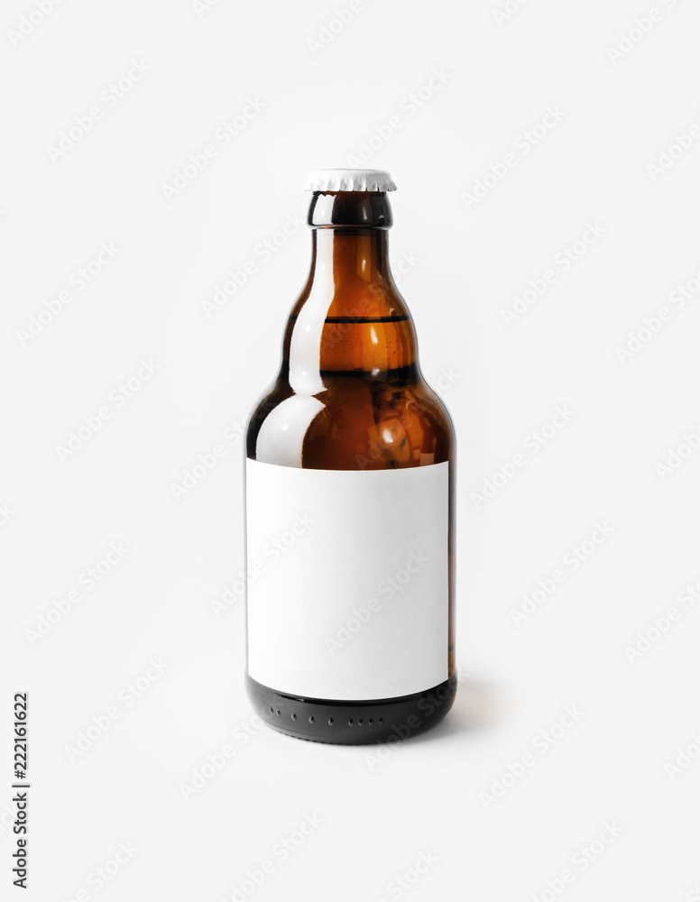 Brown beer bottle with blank label. Responsive design mockup. Brown beer bottle with blank label. Responsive design mockup.