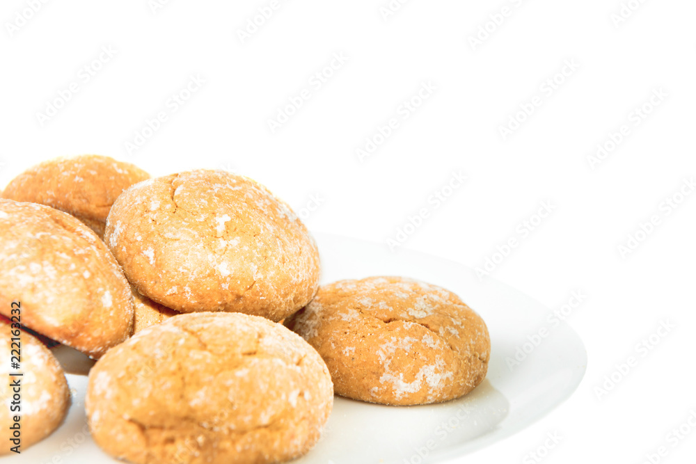 Sweet cookies on white plate isolated on white background