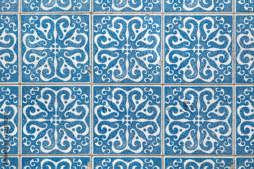 Traditional Portuguese azulejo tiles on the building in Porto, Portugal.