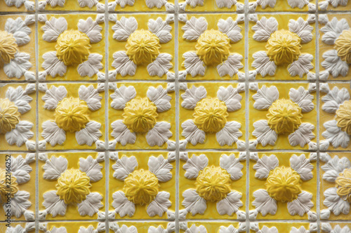 Traditional Portuguese azulejo tiles on the building in Porto, Portugal.