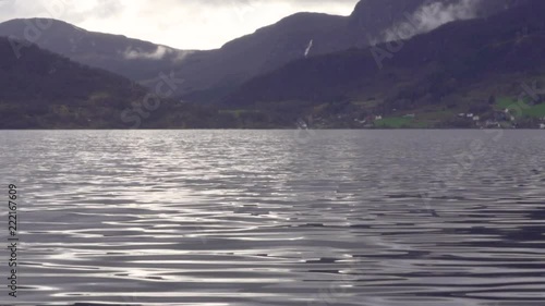 Water undulating on Sandeid fjord_slomo photo