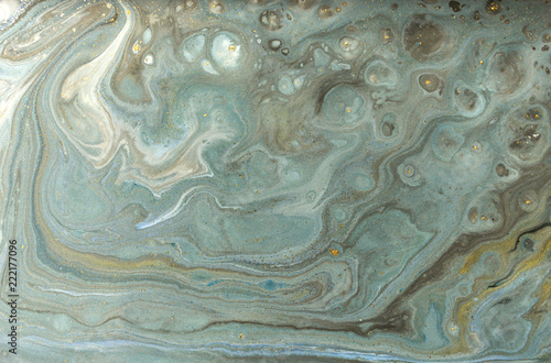 Gold marbling texture design. Blue and golden marble pattern. Fluid art.