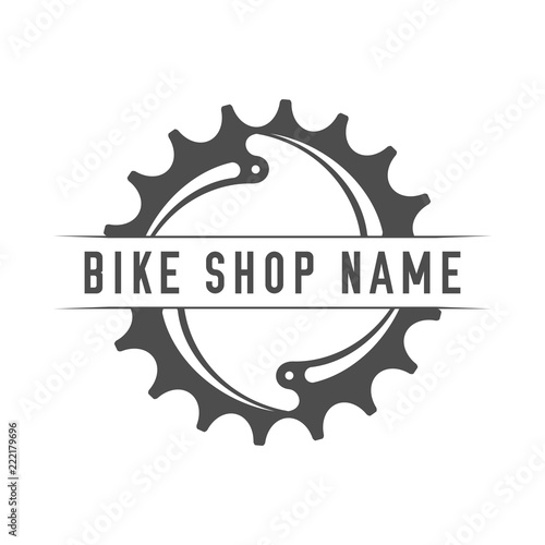 Bikes Shop Emblem. Design Element for Bike Shop or Advertising Banner. Chainring and Place for Your Bike Shop Name, Monochrome Vector Illustration.