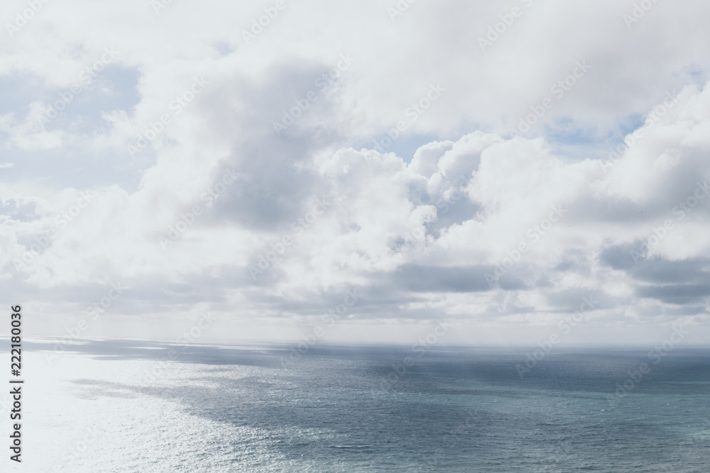 Stormy Sea and Sky. Thundery Clouds and Gray Ocean. Wild Nature Dark Dramatic Background. Toned and Filtered Square Photo with Copy Space. Stormy Sea and Sky. Thundery Clouds and Gray Ocean. Wild Nature Dark Dramatic Background. Toned and Filtered Square Photo with Copy Space.