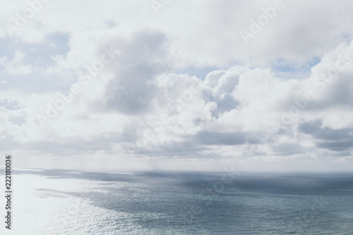 Stormy Sea and Sky. Thundery Clouds and Gray Ocean. Wild Nature Dark Dramatic Background. Toned and Filtered Square Photo with Copy Space.