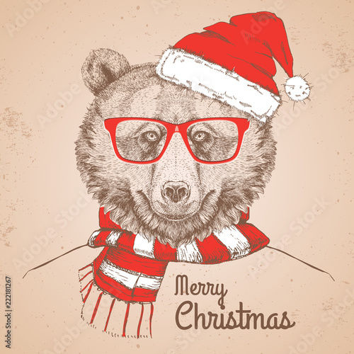 Christmas Hipster fashion animal bear dressed  a New Year hat and scarf