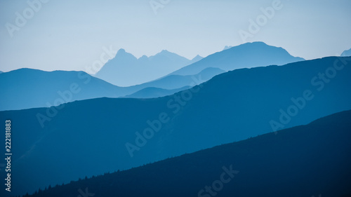 Fototapeta Naklejka Na Ścianę i Meble -  mountain top panorama in  autumn covered in mist or clouds
