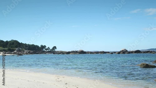 the beautiful beachof cccc on the galician coast of spain on a summer day photo