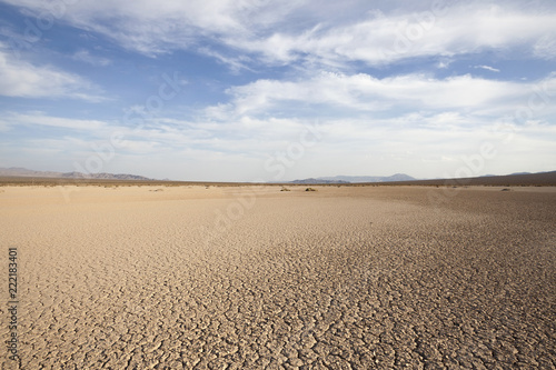 Dry lake between Baker and Death Valley in the California Mojave desert.   photo