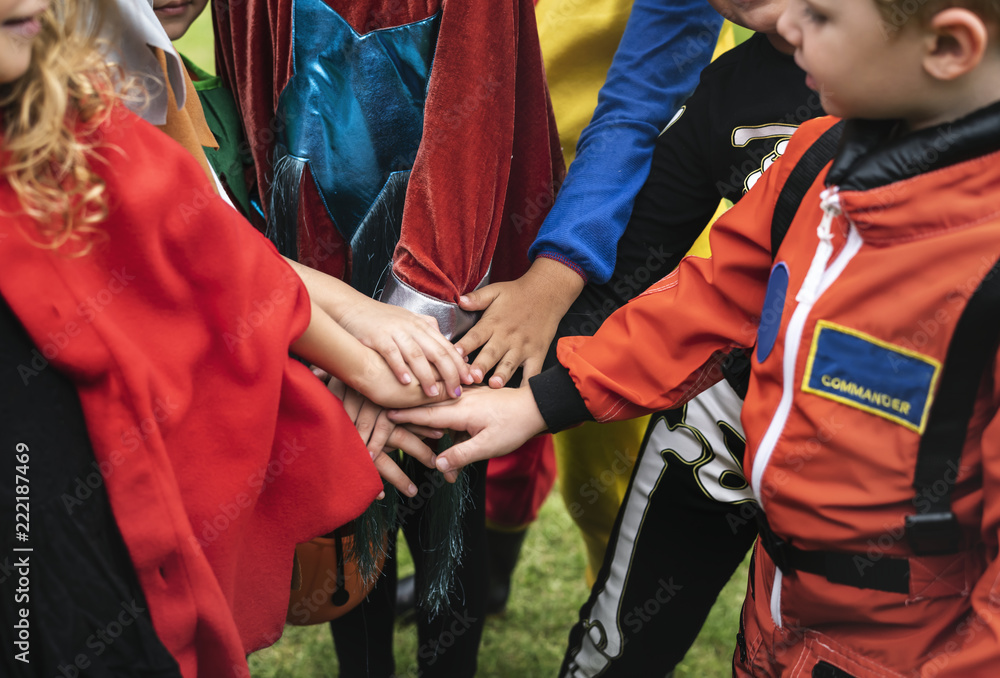 Fototapeta premium Little children trick or treating on Halloween