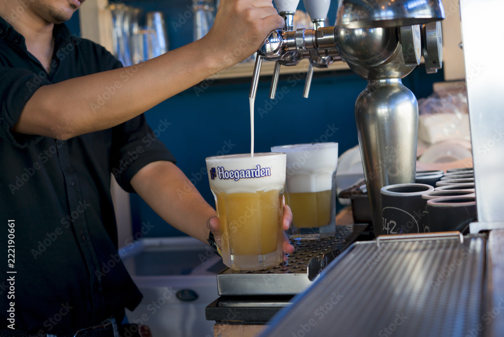 custom made wallpaper toronto digitalBANGKOK, THAILAND. September 12, 2018: Hoegaarden draft Belgium beer in large size glass on counter bar in pub was taken in Bangkok, Thailand.