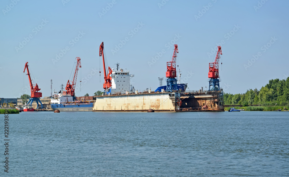 Floating ship dock in port of the city Svetlyj. Kaliningrad region Floating ship dock in port of the city Svetlyj. Kaliningrad region