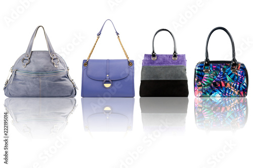 Set of purple handbags.Isolated on white background.Front view.



