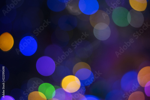 Multicolored bokeh on a night background