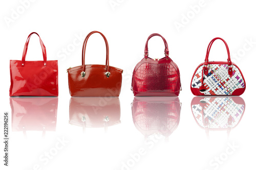 Red female handbags collection isolated on white background.Front view.

