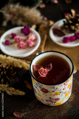 Flower tea: tea rose, petals, edible flowers, on a light background