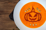 Pumpkin soup with a pumpkin for Haloween