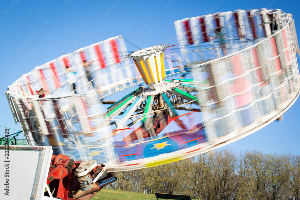 Fast Spinning and Tilting Amusement Park Ride at faire Stock 写真 | Adobe ...