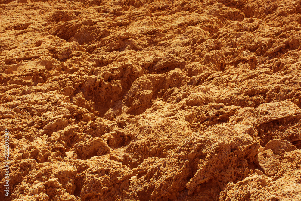 Stone surface orange background, uneven rock texture Stock Photo ...