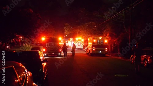 Firetrucks and ambulance on a narrow residential street HD