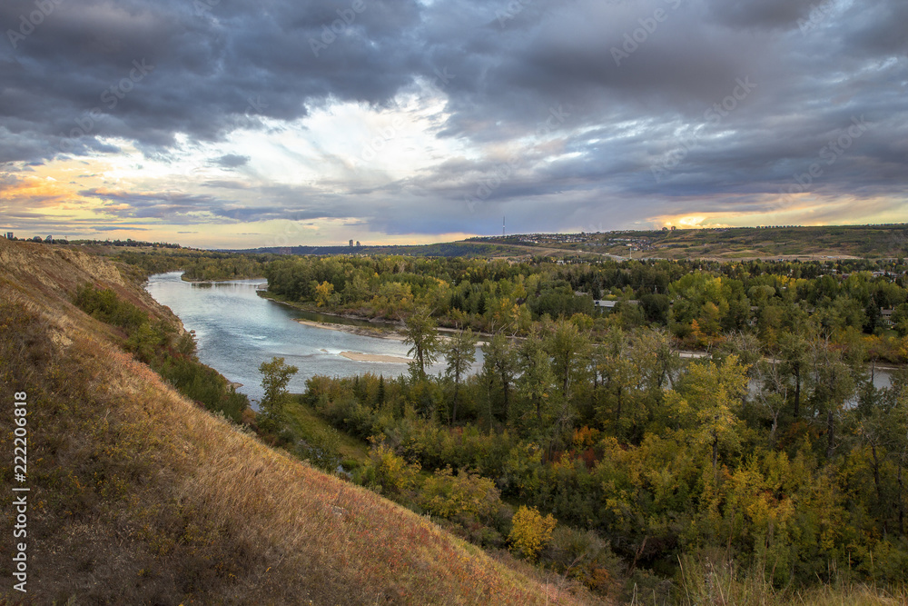 West Calgary view towards east and downtown with Bow river, on a fall evening West Calgary view towards east and downtown with Bow river, on a fall evening