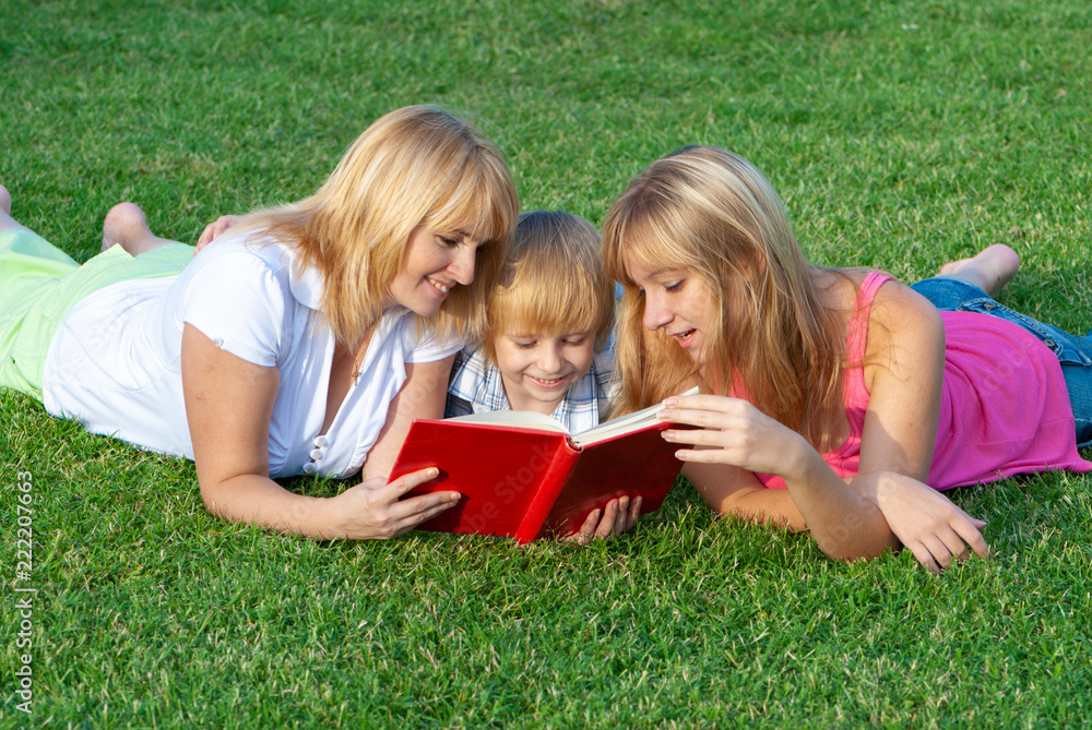 happy family in the park reading book happy family in the park reading book