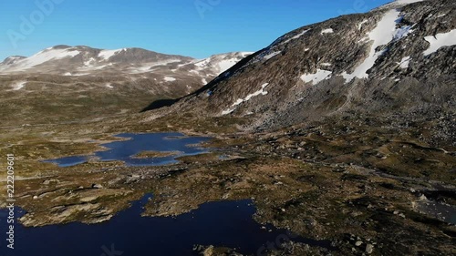 Aerial view. Norway landscape with mountain tarns. Norwegian national tourist scenic route Gamle Strynefjellsvegen from Grotli to Videaeter. photo