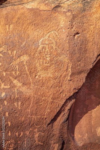 Birthing Rock petroglyph art panel detail located up a gravel road outside of Moab Utah photo