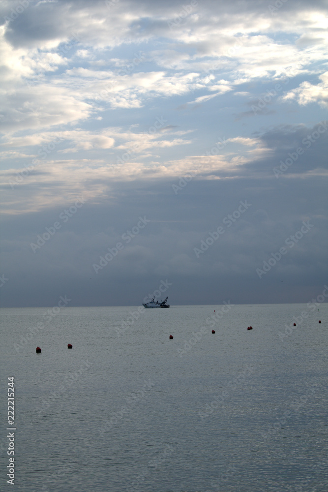 horizon,fishing boat,sea,water,seascape,sky,cloud,calm