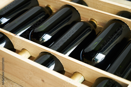 Tableau sur toile Top view of a case of cabernet sauvignon wine bottles