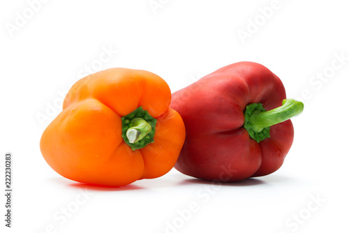 Red and orange pepper bell or paprika isolated on white background