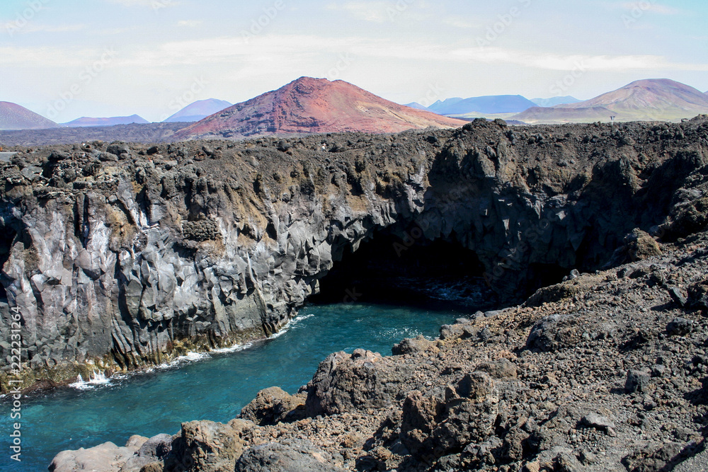 Los Hervideros in Lanzarote, a sort of pool of water where the waves hit the rocks savagely, Canary Islands
