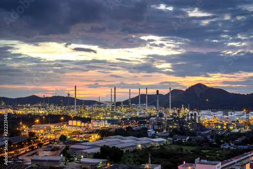Beautiful sunset petrochemical oil refinery factory plant cityscape of Chonburi province at night on 2017 , landscape Thailand