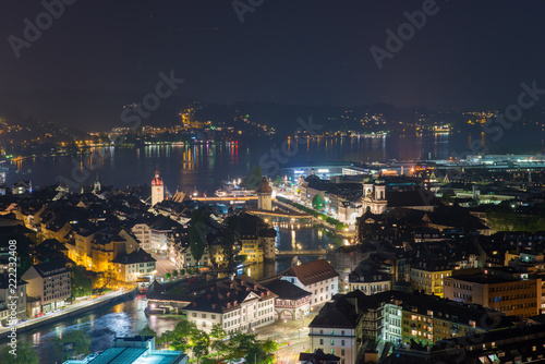 Aerial view of old town of Lucerne  wooden Chapel bridge  stone Water tower  Reuss river and Lake Lucerne  Switzerland