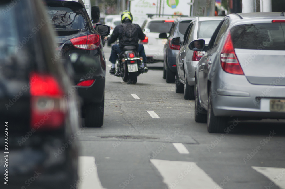 biker in between lanes biker in between lanes