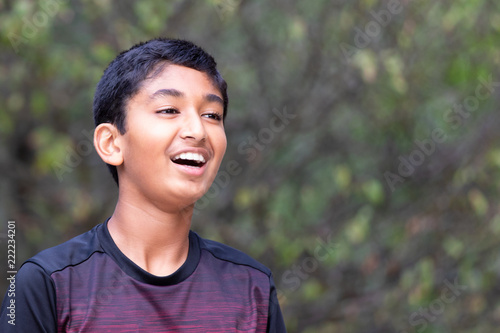 Smiling Outdoor Portrait of a Young Boy