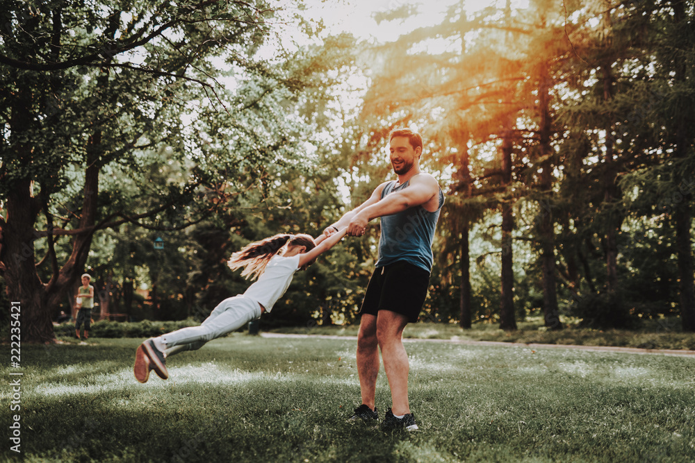 Father and Daughter Have Fun Outdoor in Park. Father and Daughter Have Fun Outdoor in Park.