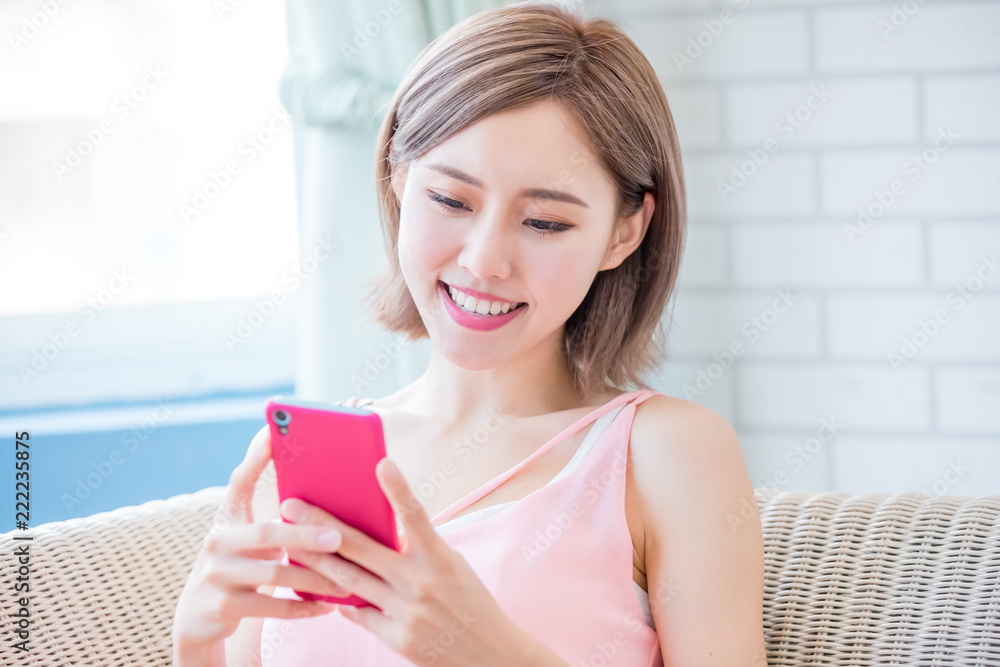 woman use phone happily