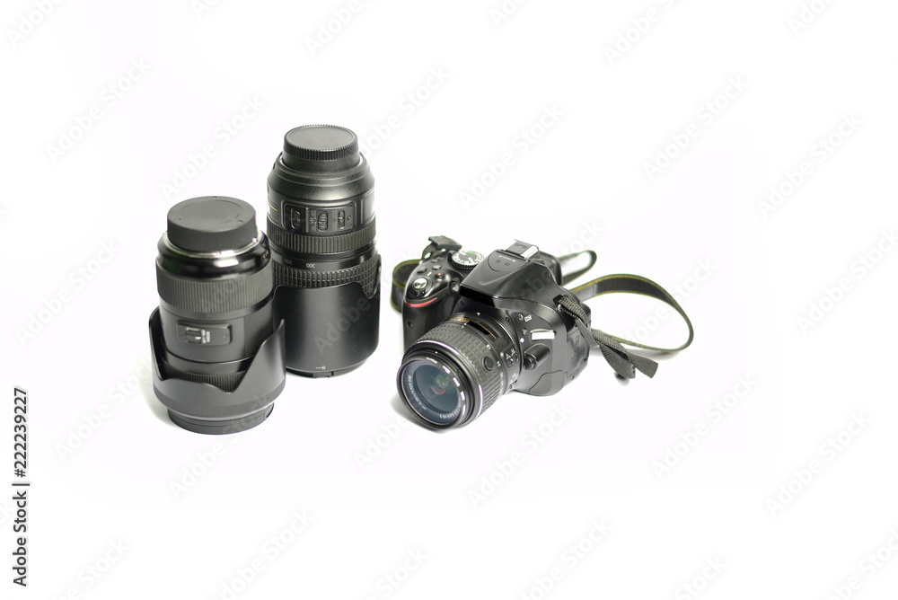 Digital SLR Camera and lens isolated on white background Digital SLR Camera and lens isolated on white background