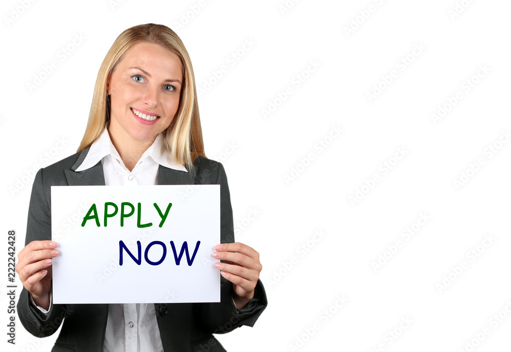 Happy businesswoman holding a white banner and smiling Happy businesswoman holding a white banner and smiling