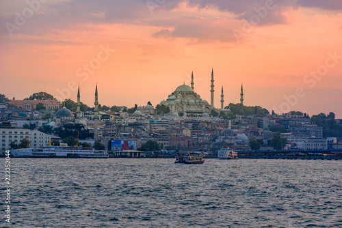 Photography Galata Bridge and Suleymaniye Mosque in the Fatih district at Golden Horn River before sunset, Istanbul, Turkey