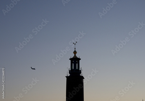 Stockholm Town City Hall at Riddarfjärden in sunset photo