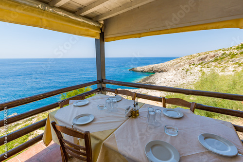 Traditional Greece restaurant and sea view. Greece, view from restaurant to Zakynthos town with harbor