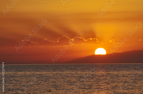 Fototapeta zachód słońca nad jeziorem Issyk-Kul