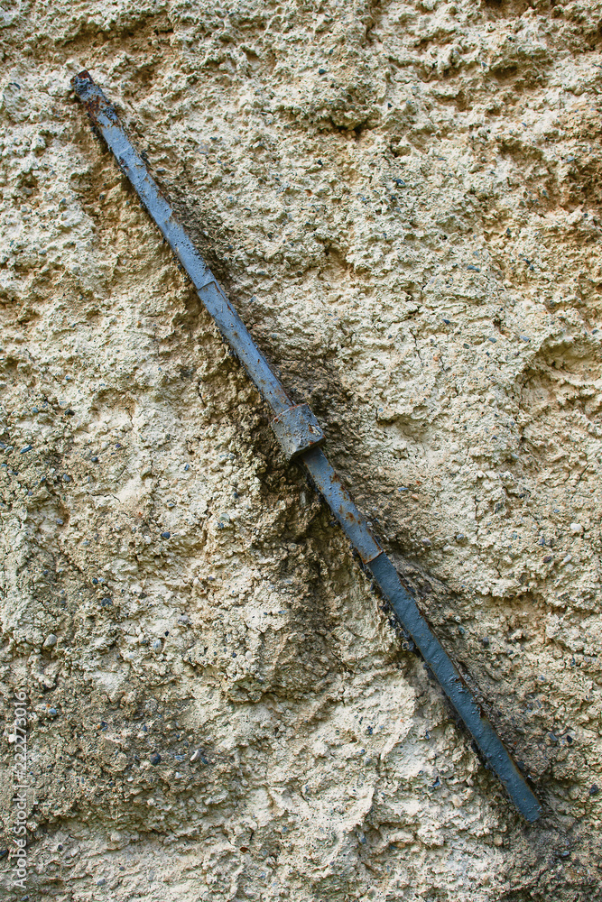 Ancient locking key for tie rods in an ancient village in northern Italy Ancient locking key for tie rods in an ancient village in northern Italy
