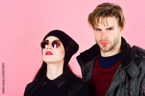 brutal bearded man with a mustache with a girl with dark hair photo