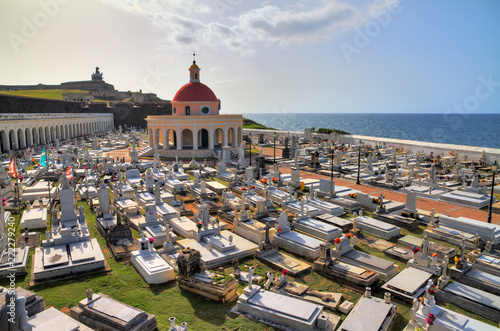 Santa Maria Magdalena de Pazzis Cemetery in San Juan, Puerto Rico, with fort El Morro in the background
 photo