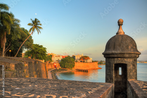 Beautiful summer afternoon at the outer wall with sentry box of fort San Felipe del Morro in old San Juan in Puerto Rico photo